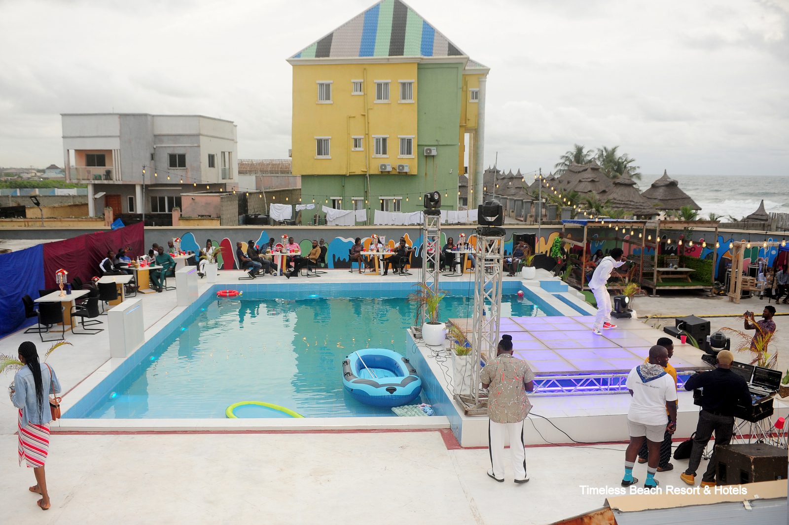 Poolside event with a live performance stage beside the resort swimming pool